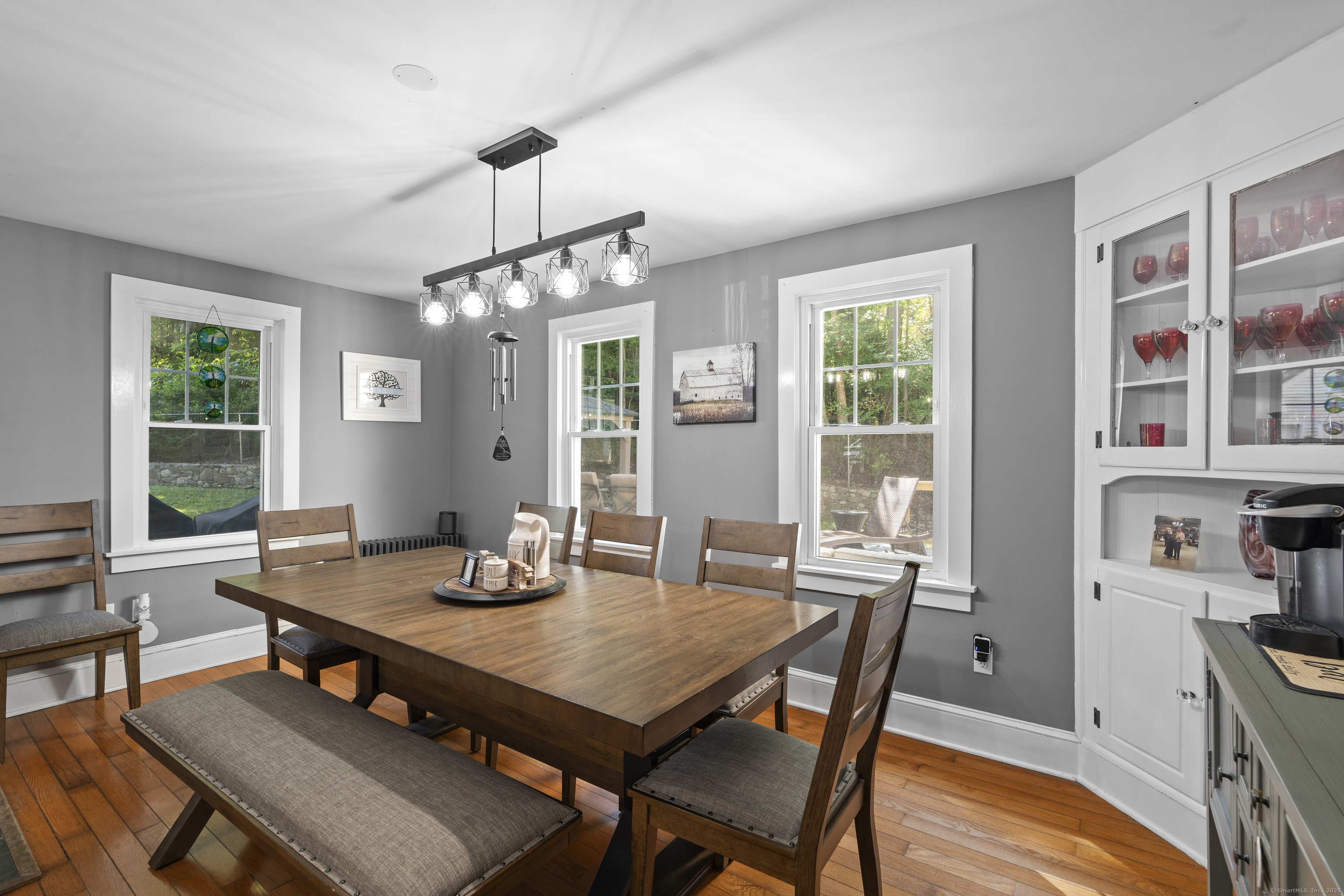 74 Middle Quarter Road Woodbury, CT 06798 - Photo 23 of 38 a view of a dining room with furniture window and outside view