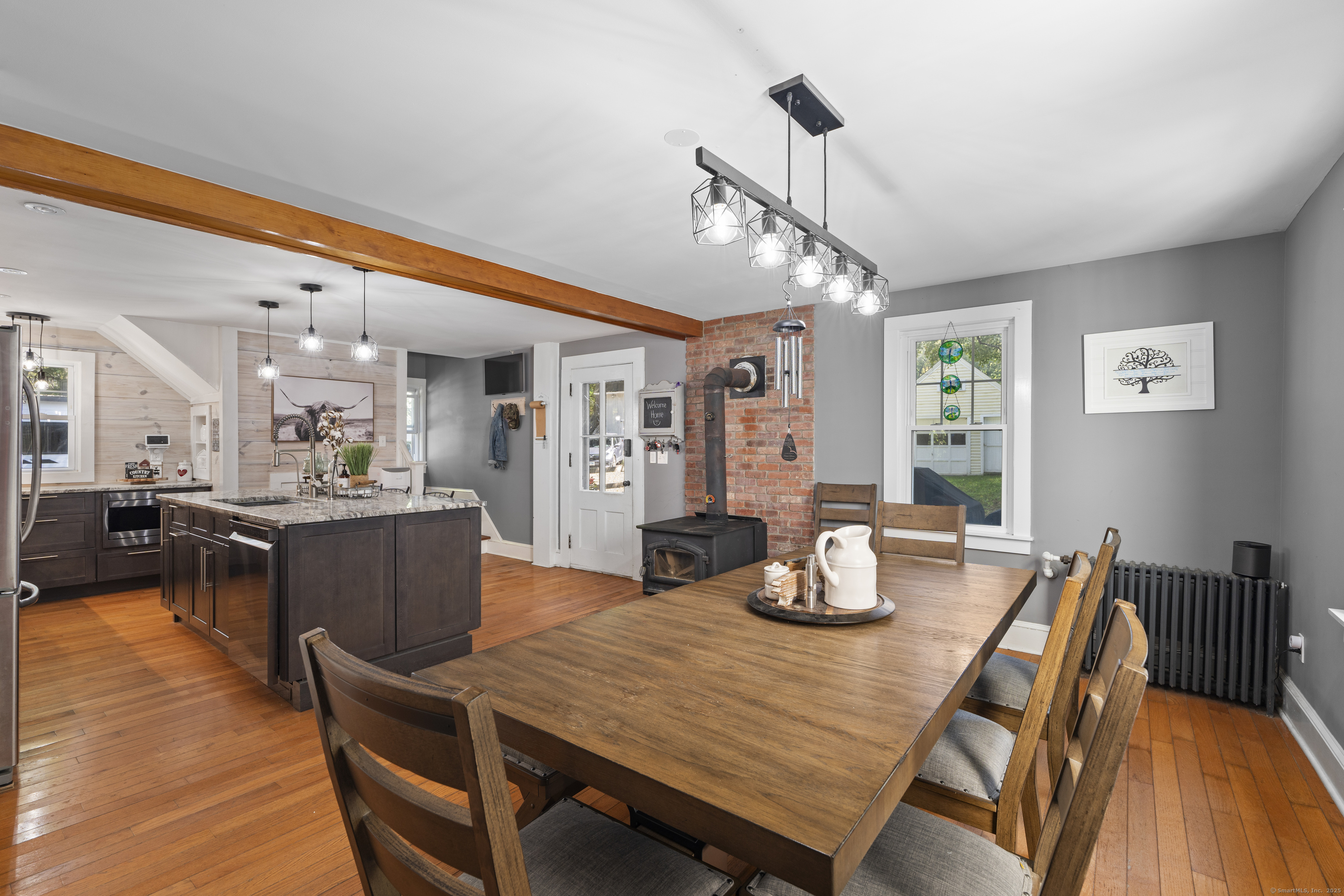 74 Middle Quarter Road Woodbury, CT 06798 - Photo 24 of 38 a dining room with furniture and window