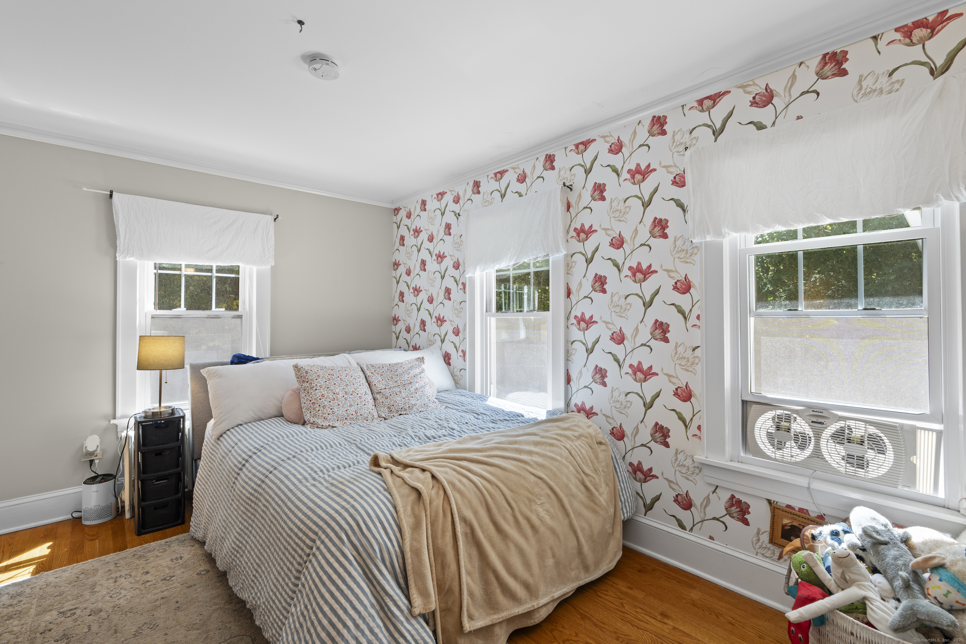 74 Middle Quarter Road Woodbury, CT 06798 - Photo 36 of 38 a bedroom with a bed and a window with rug