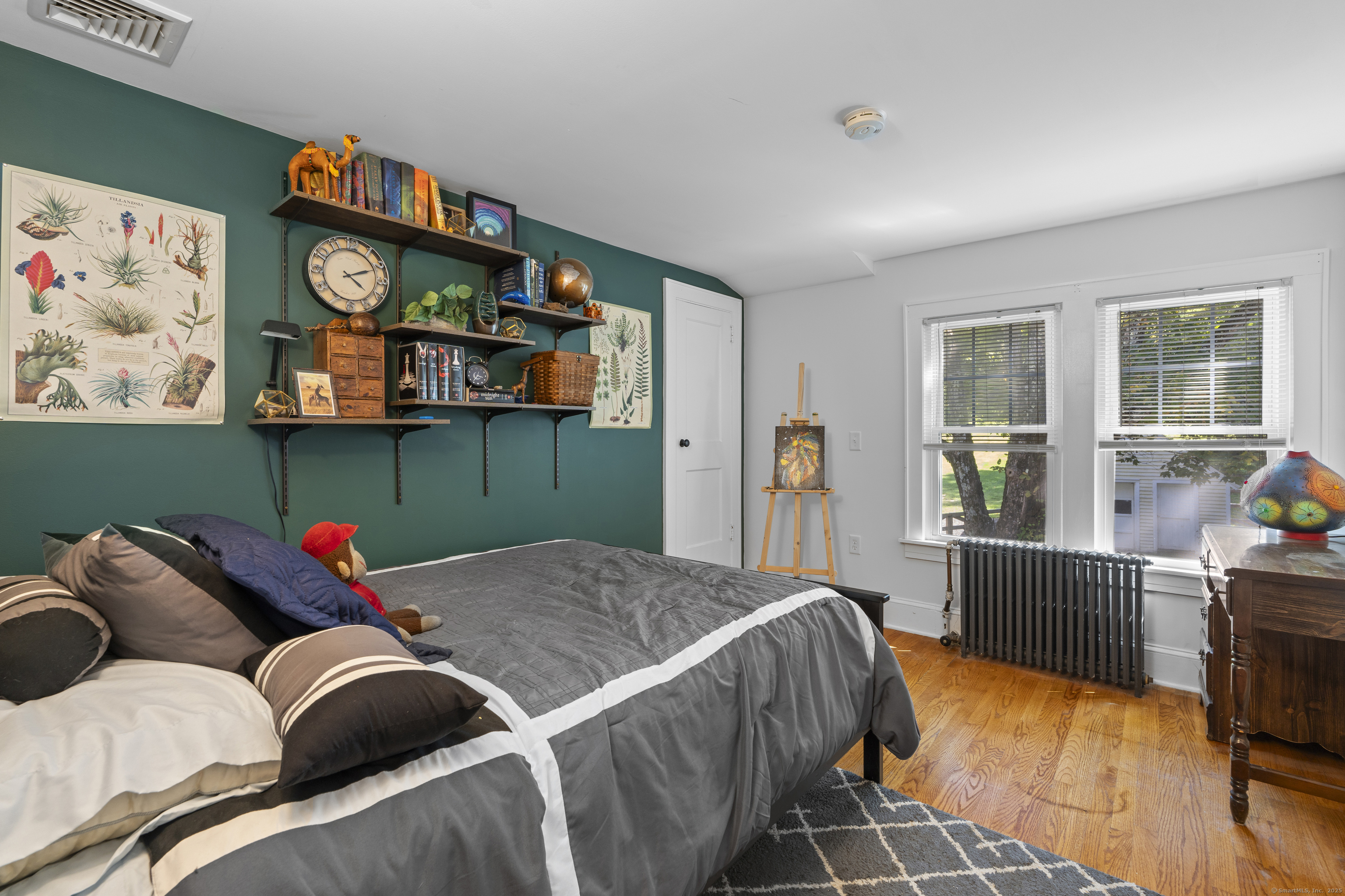 74 Middle Quarter Road Woodbury, CT 06798 - Photo 37 of 38 a bed room with a bed and a window