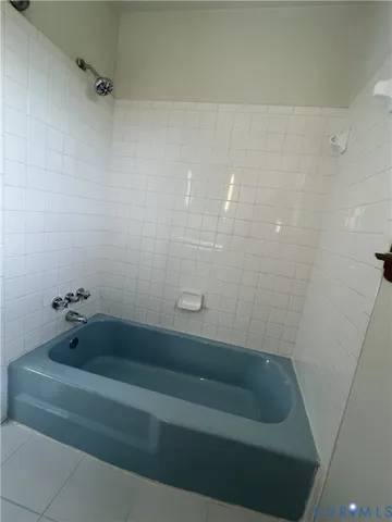 a bathroom with a bathtub