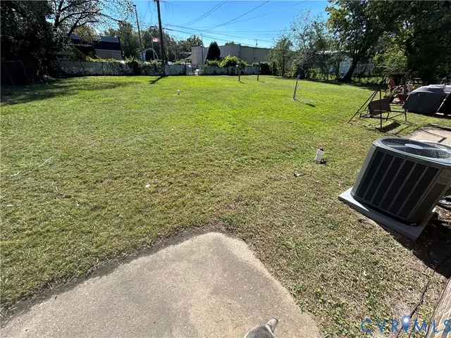 a view of a field with an trees
