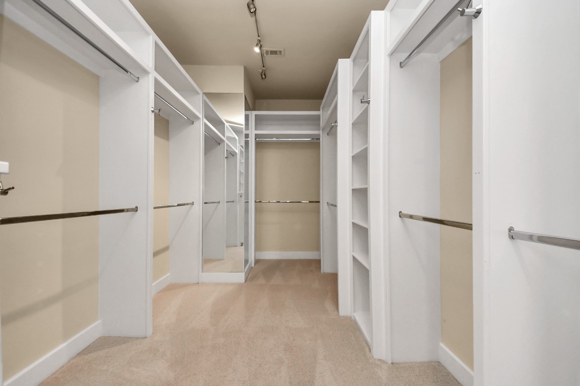 1610 Calumet Street Houston, TX 77004 - Photo 14 of 26 Primary suite features a large walk-in closet with integrated drawers and smart organization