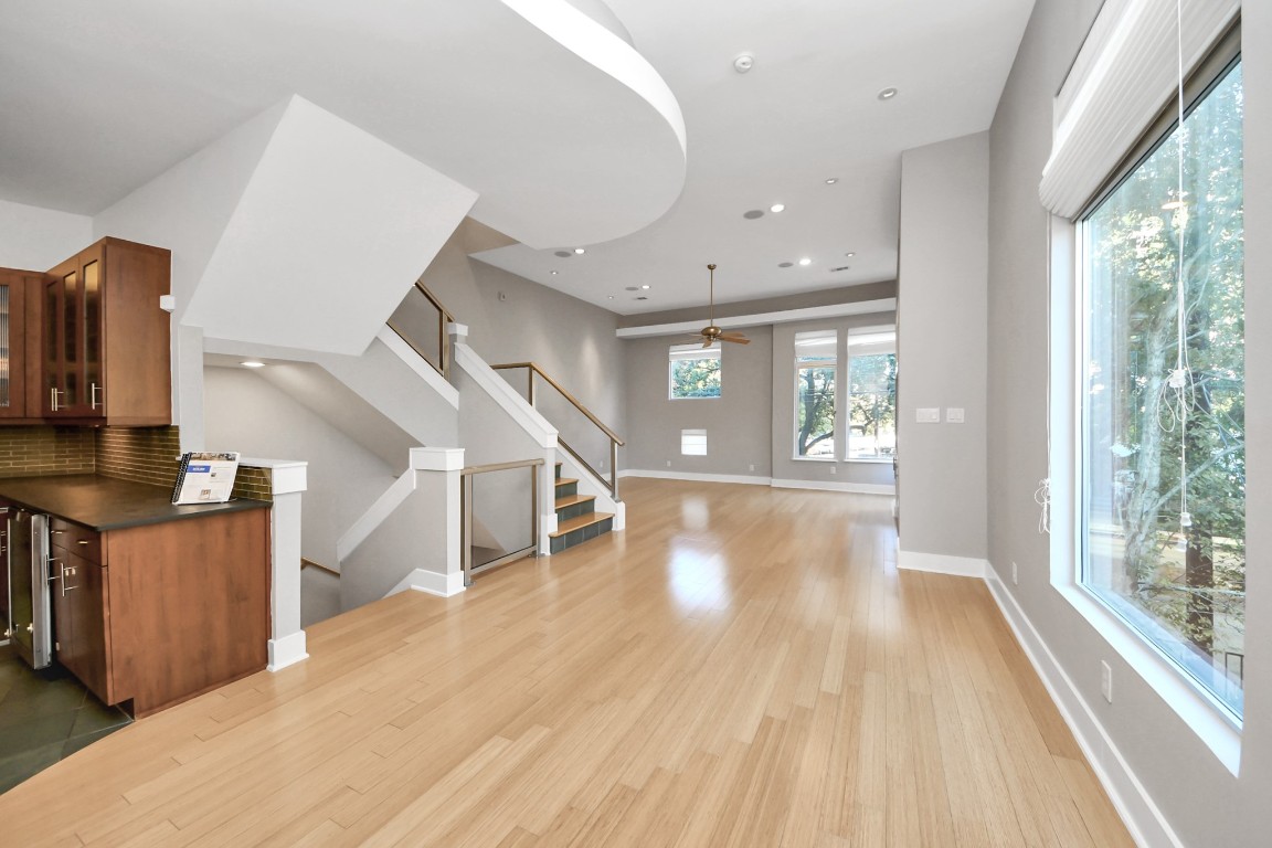 1610 Calumet Street Houston, TX 77004 - Photo 9 of 26 Combined dining and living space, offers versatility and enhances the flow between areas. This layout is popular for its ability to accommodate various activities and social gathering