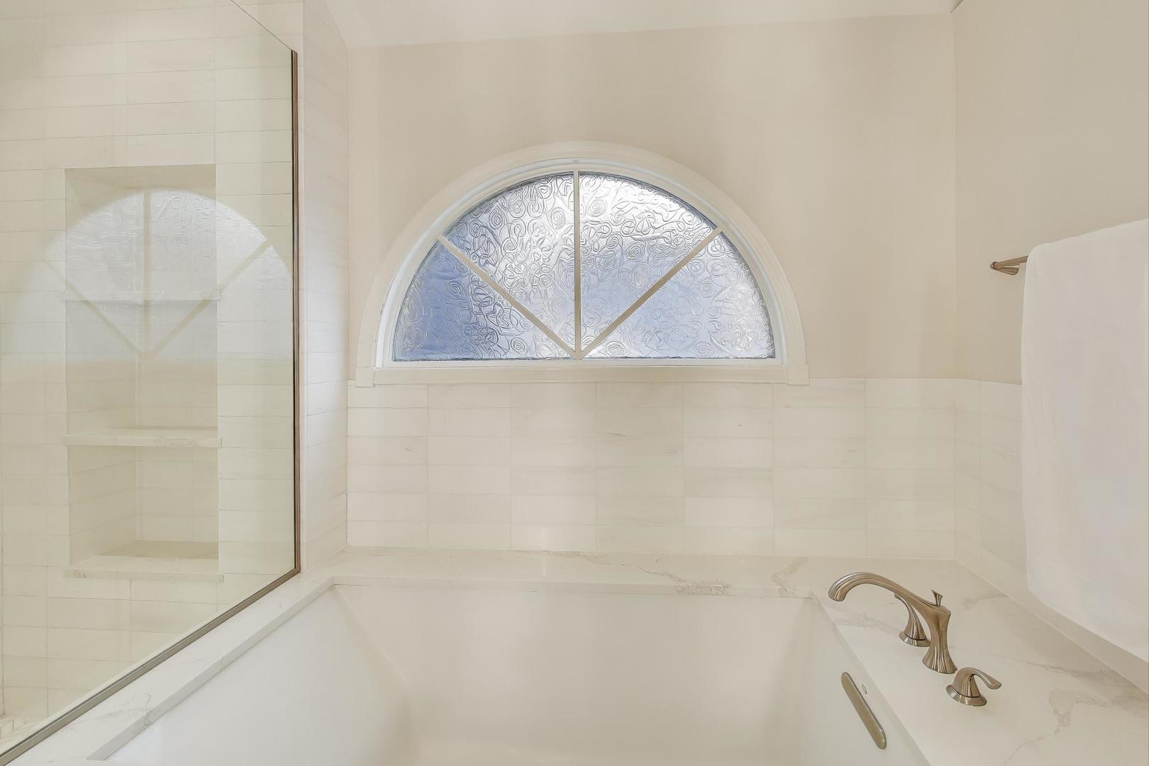 1614 West Erie Street Chicago, IL 60622 - Photo 18 of 50 a bathroom with a sink and mirror