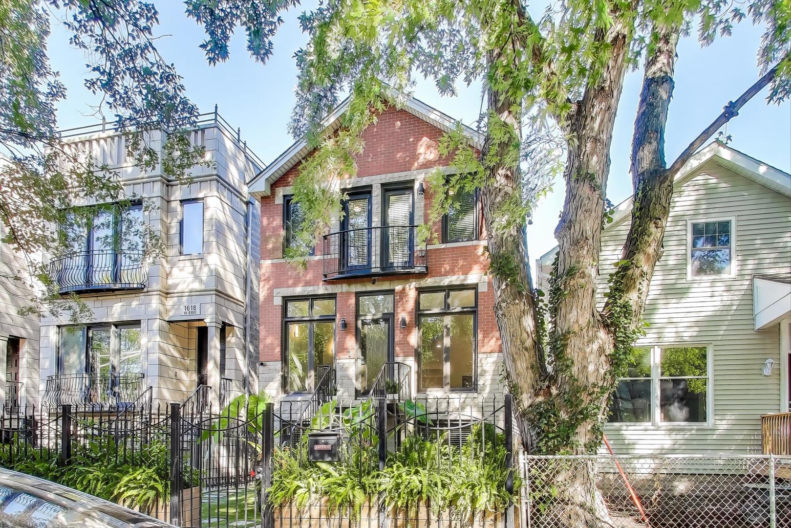 1614 West Erie Street Chicago, IL 60622 - Photo 2 of 50 a front view of a houses with tree s