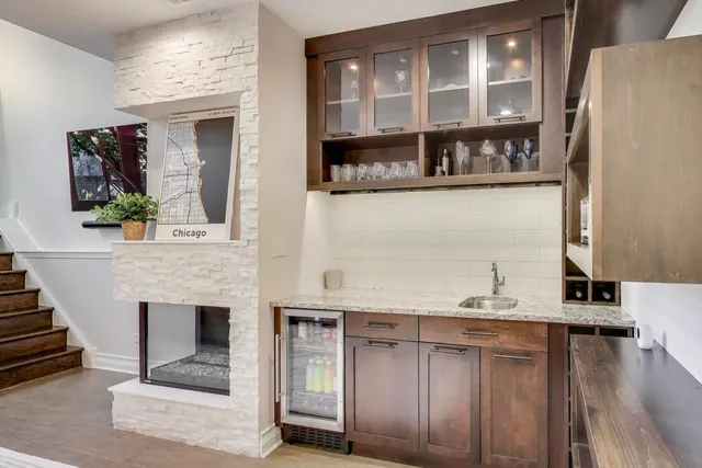 a view of living room with furniture and fireplace