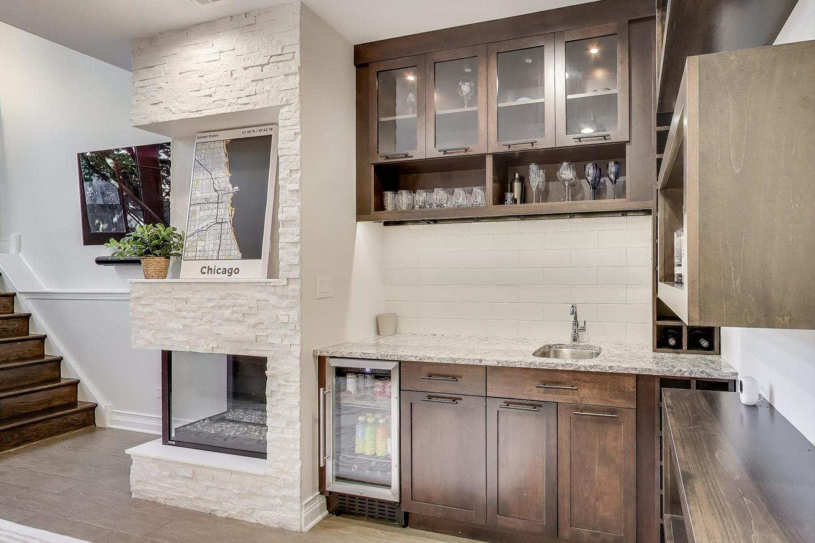 1614 West Erie Street Chicago, IL 60622 - Photo 30 of 50 a view of living room with furniture and fireplace