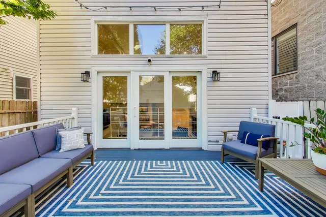 a view of a house with a large window