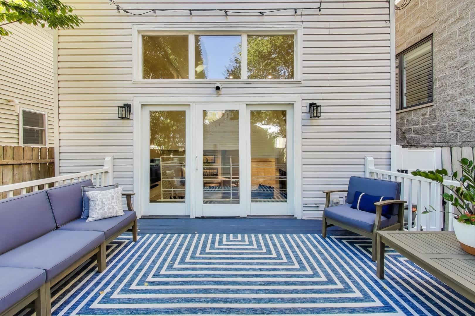 1614 West Erie Street Chicago, IL 60622 - Photo 39 of 50 a view of a house with a large window