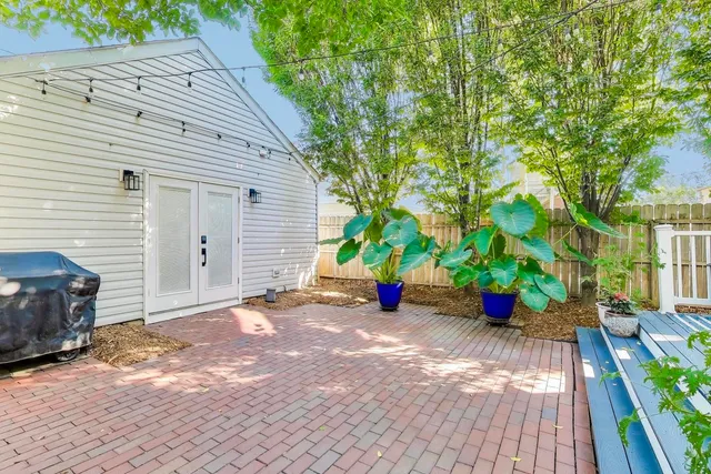 a view of a backyard with a patio