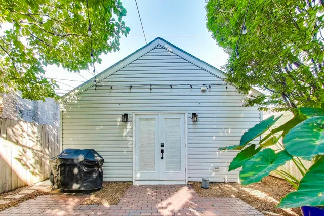 a view of a house and a yard