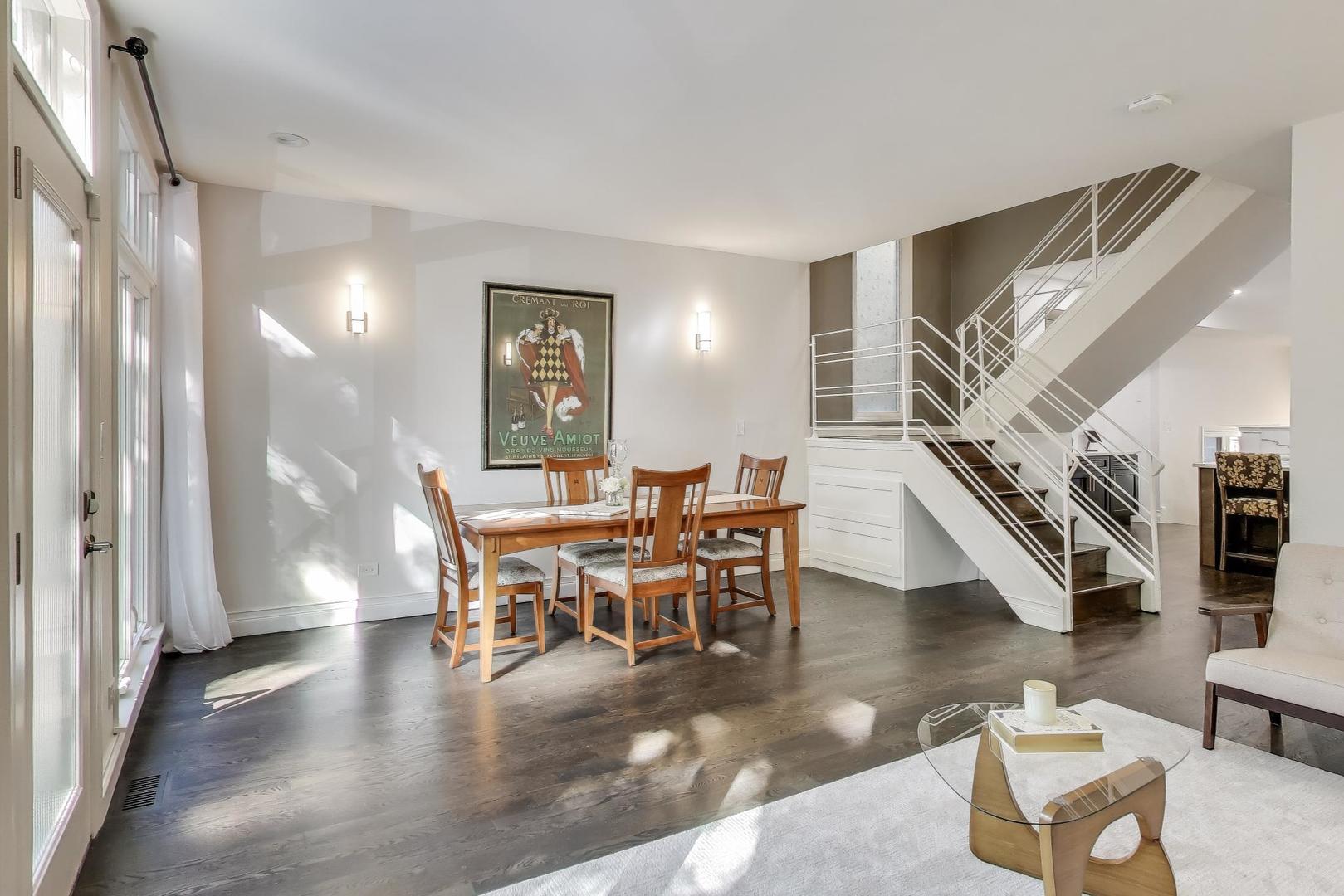 1614 West Erie Street Chicago, IL 60622 - Photo 6 of 50 a view of a livingroom with furniture and staircase