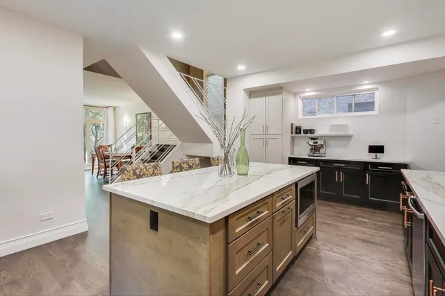 a kitchen with a stove and a sink