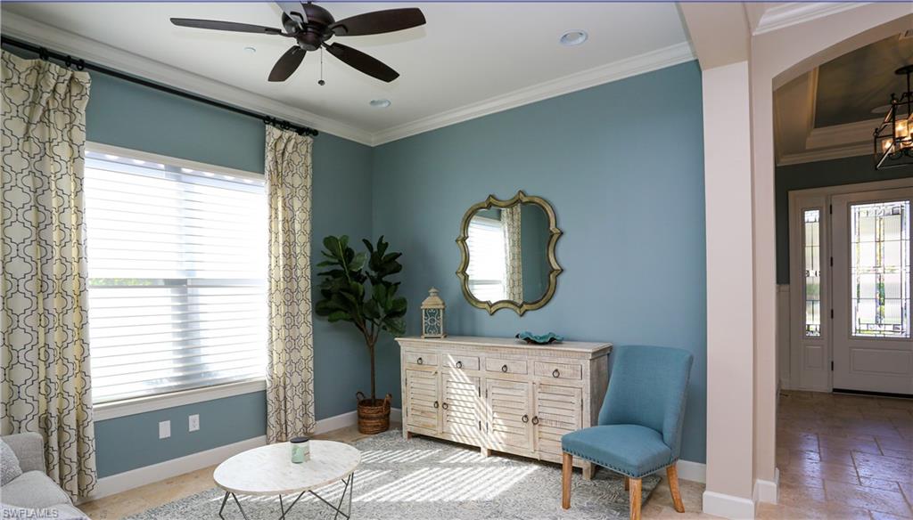 10155 Coconut Road Estero, FL 34135 - Photo 11 of 34 a living room with furniture and a window