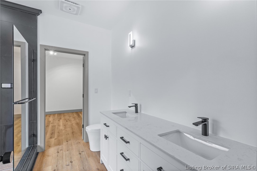 7725 Northeast Greenbrier Road Georgetown, IN 47122 - Photo 35 of 63 Primary suite bathroom