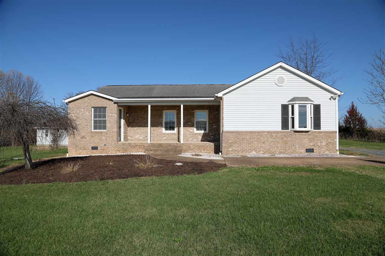 5163 East Timber Ridge Road Mount Crawford, VA 22841 - Photo 2 of 48 a front view of a house with a yard and garage