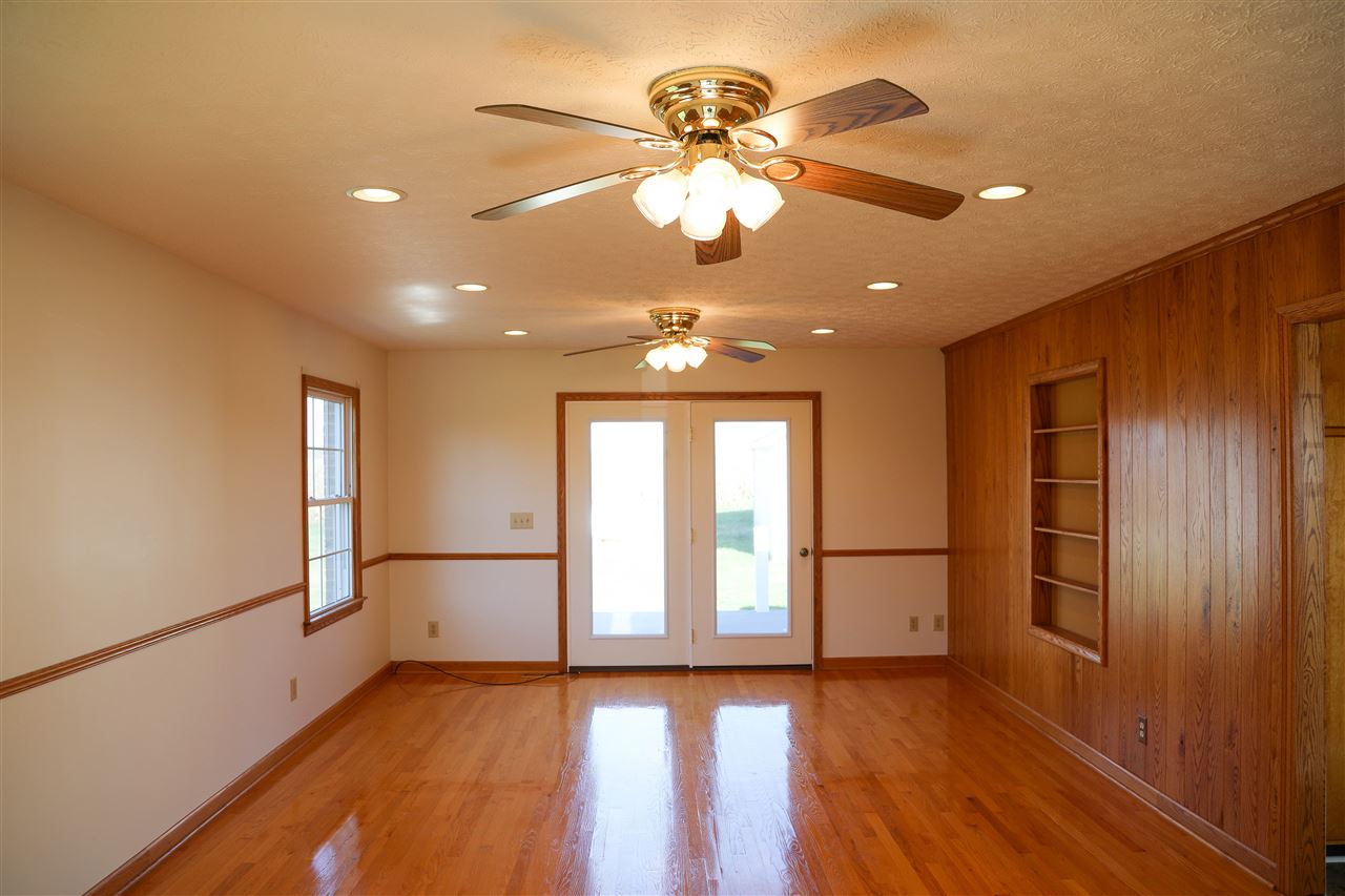 5163 East Timber Ridge Road Mount Crawford, VA 22841 - Photo 21 of 48 a view of an empty room with a window and wooden floor