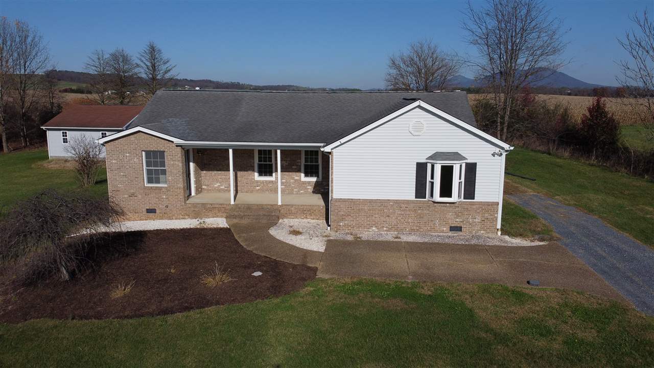 5163 East Timber Ridge Road Mount Crawford, VA 22841 - Photo 3 of 48 a front view of a house with yard and green space