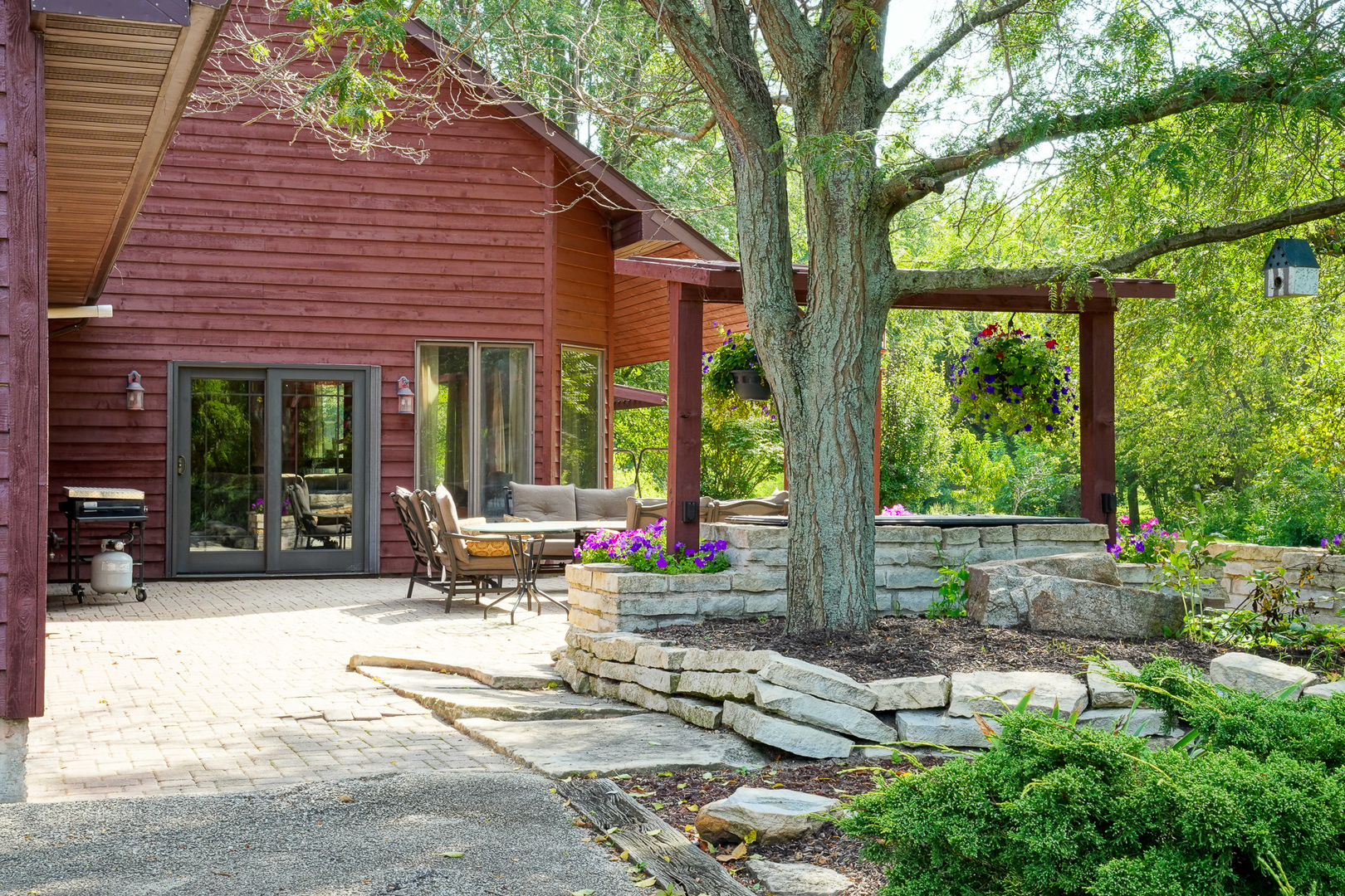 10175 Brown Road Morris, IL 60450 - Photo 4 of 31 a view of a patio with table and chairs and floor to ceiling window