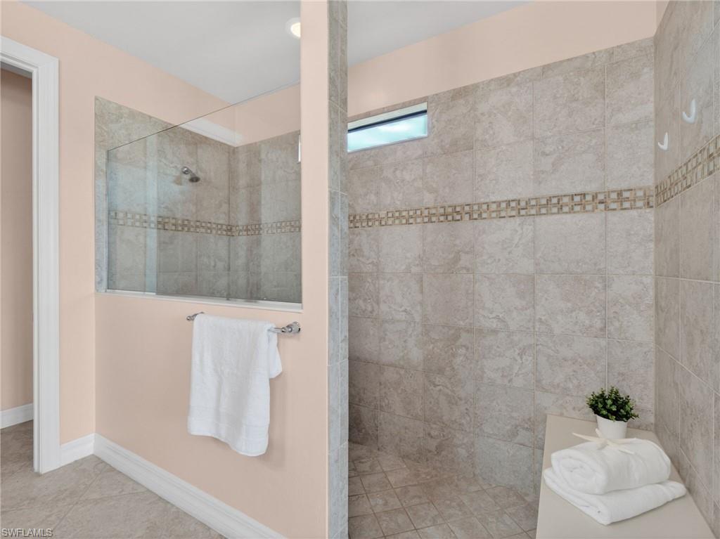 6124 Victory Drive Ave Maria, FL 34142 - Photo 29 of 50 a bathroom with a shower
