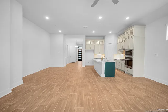 a view of kitchen with wooden floor
