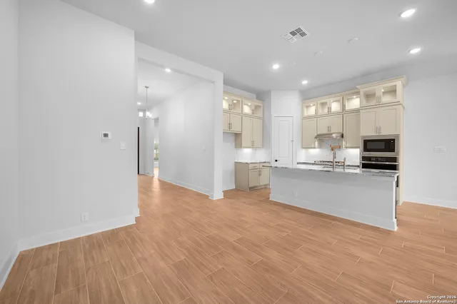 a view of kitchen with wooden floor