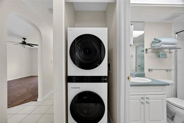 a view of a hallway with washer and dryer