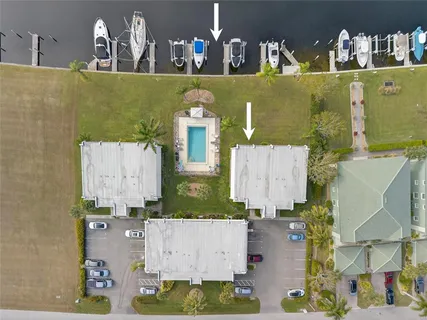 an aerial view of residential house with outdoor space and parking