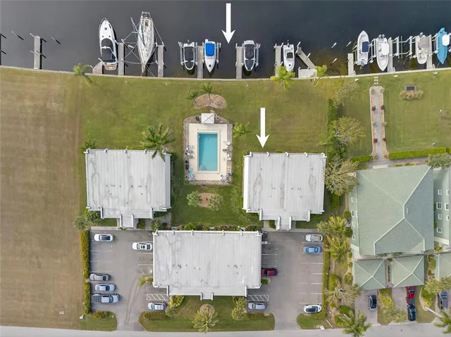 an aerial view of residential house with outdoor space and parking