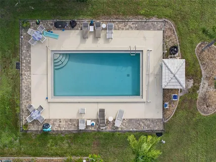 a view of front door and yard