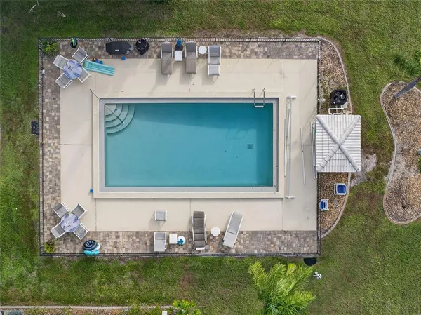 a view of front door and yard