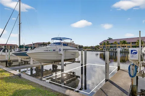 a view of a balcony with chairs