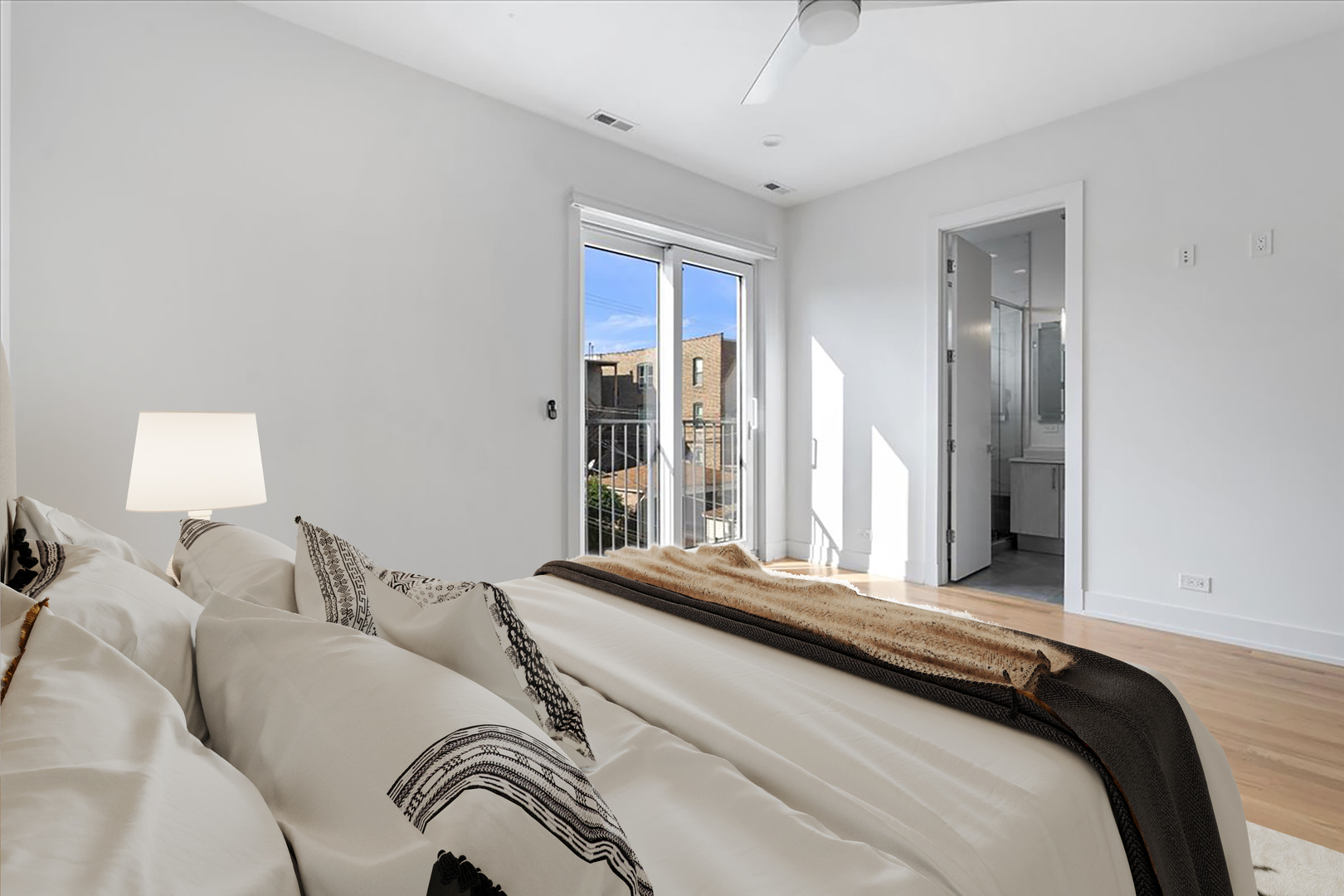 938 North California Avenue, Unit 2 Chicago, IL 60622 - Photo 10 of 20 a bedroom with a bed and a window