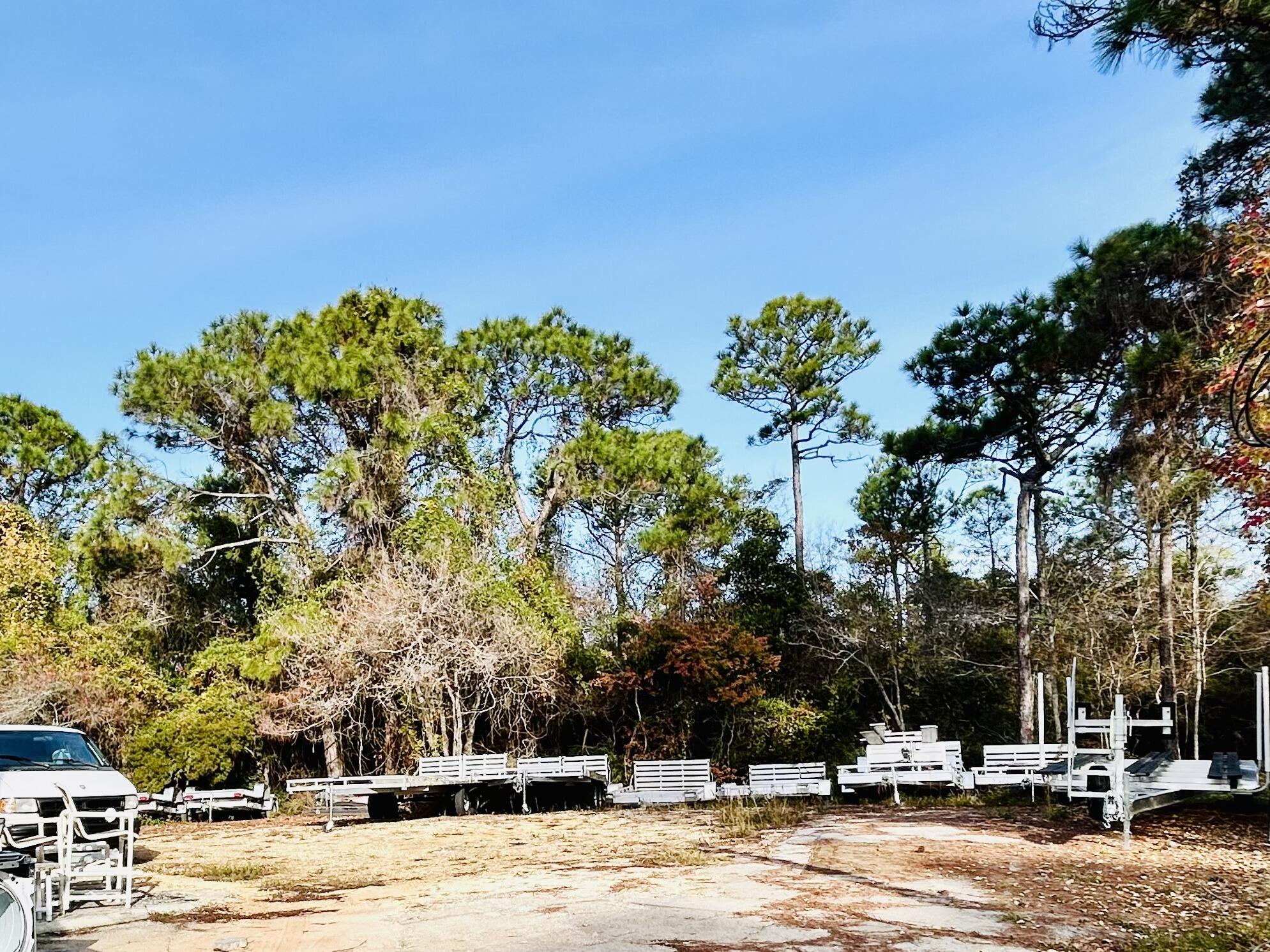 139 North Holiday Road Miramar Beach, FL 32550 - Photo 3 of 5 a view of a building with snow on the road