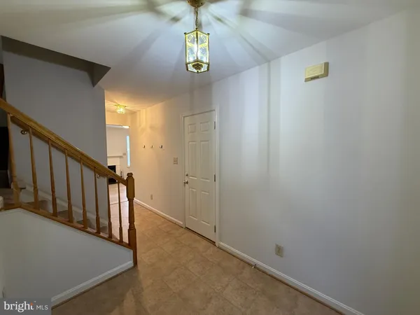 a view of hallway with stairs