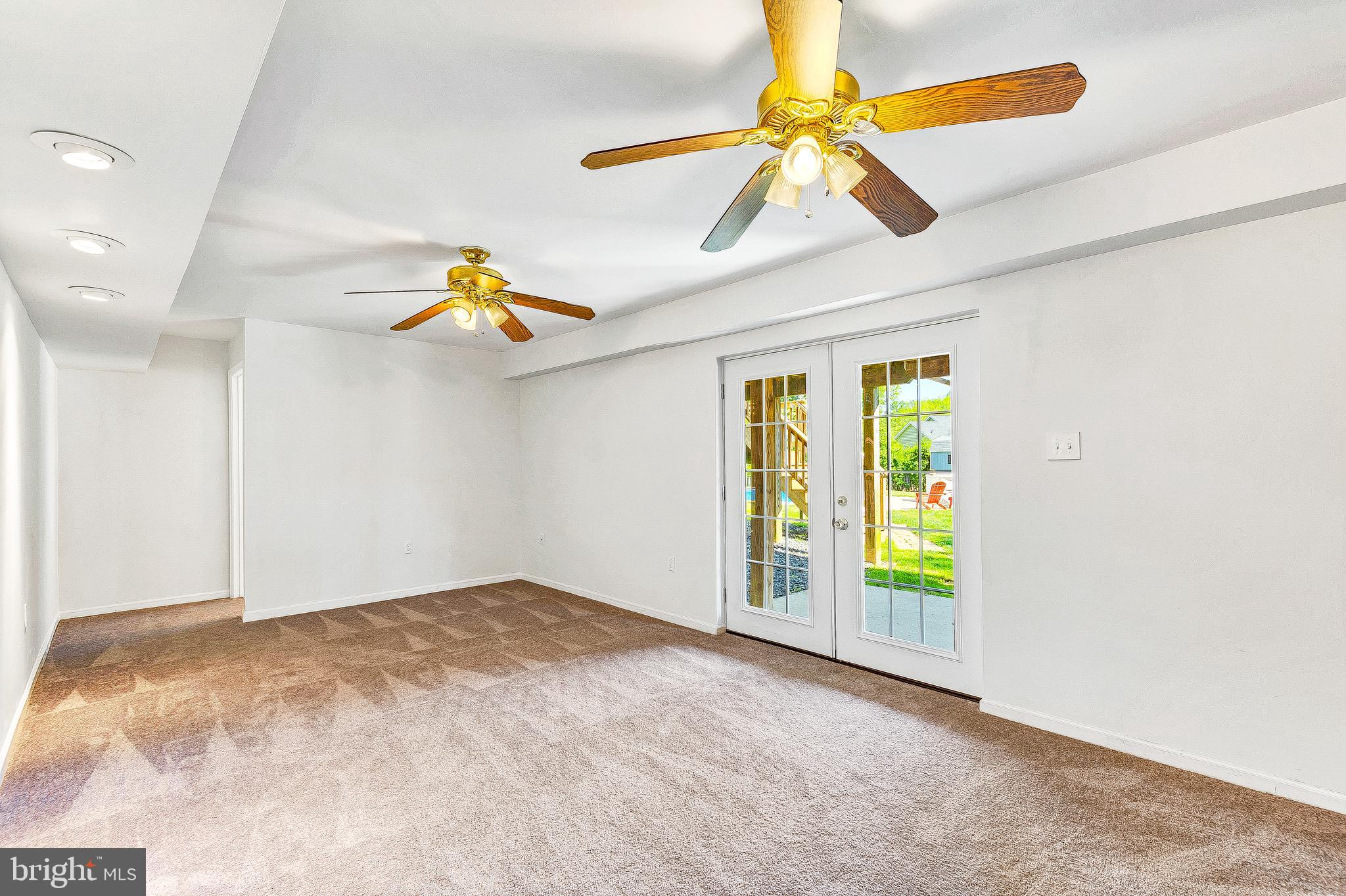 55 Walnut Creek Road Huntingtown, MD 20639 - Photo 42 of 52 Family Room With New french Doors to Pool Area...