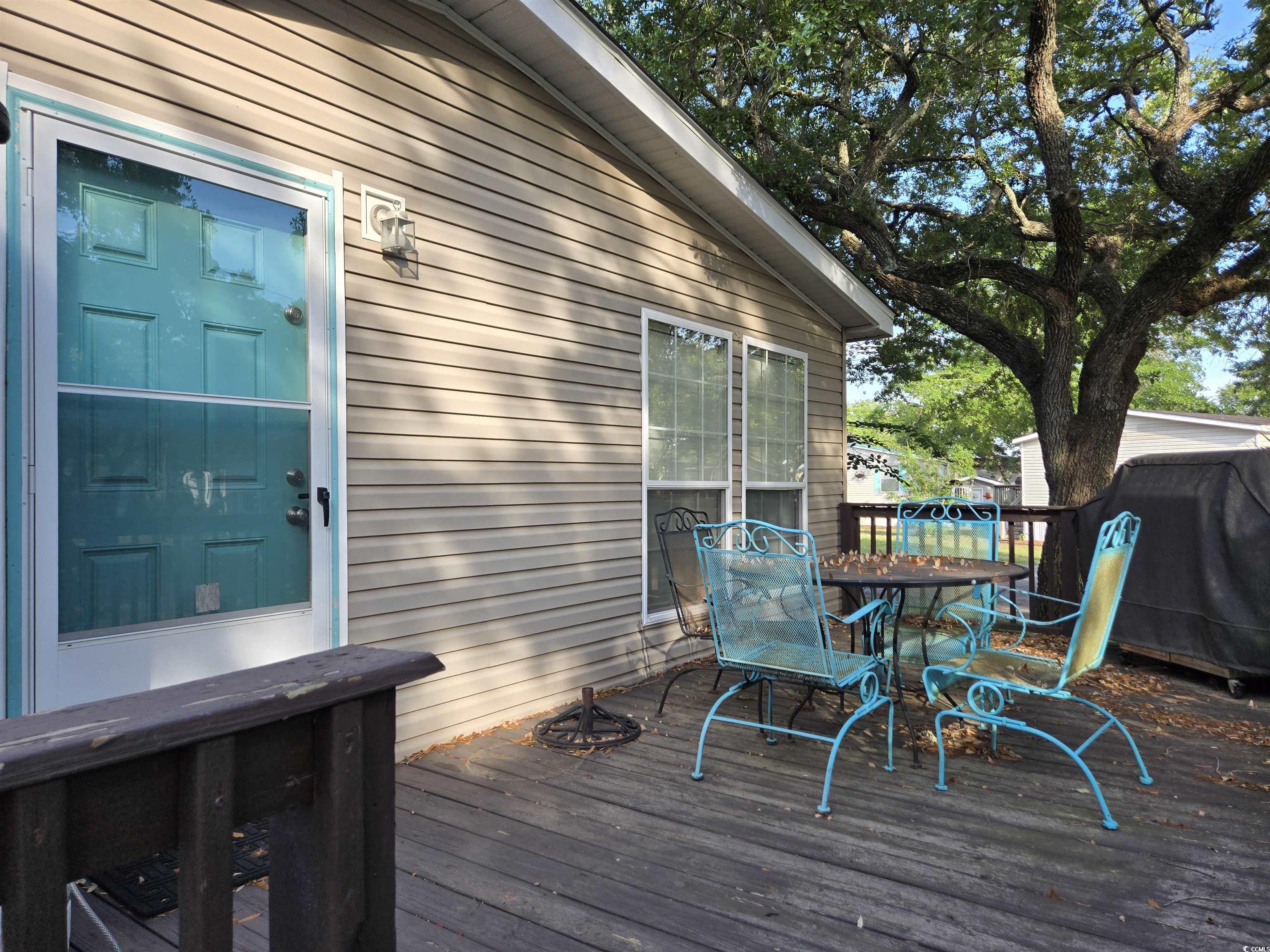 310 Clam Shell Circle Murrells Inlet, SC 29576 - Photo 6 of 32 Deck with outdoor dining area