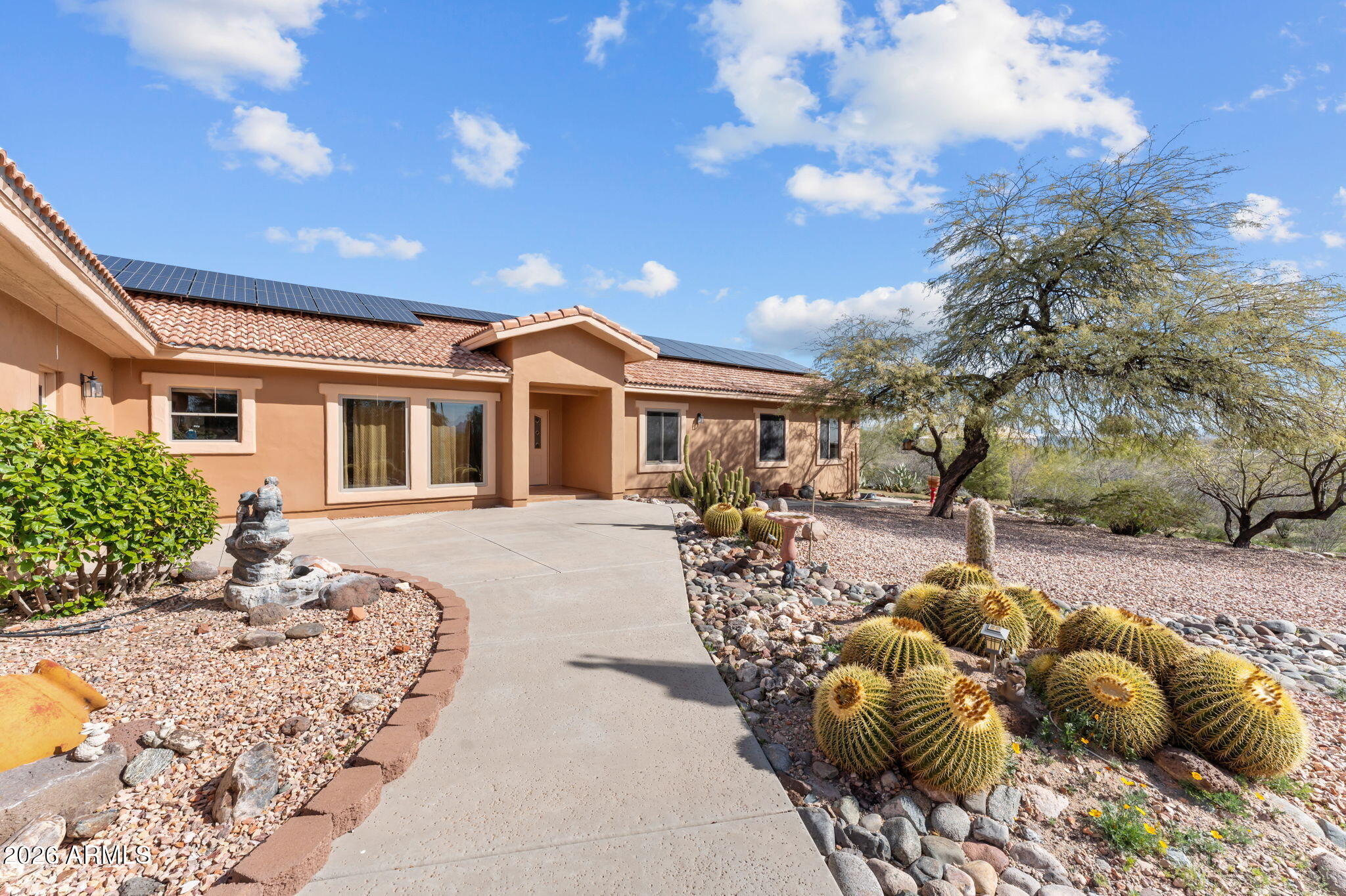 21340 Date Creek Road Wickenburg, AZ 85390 - Photo 1 of 35 a view of a house with a yard