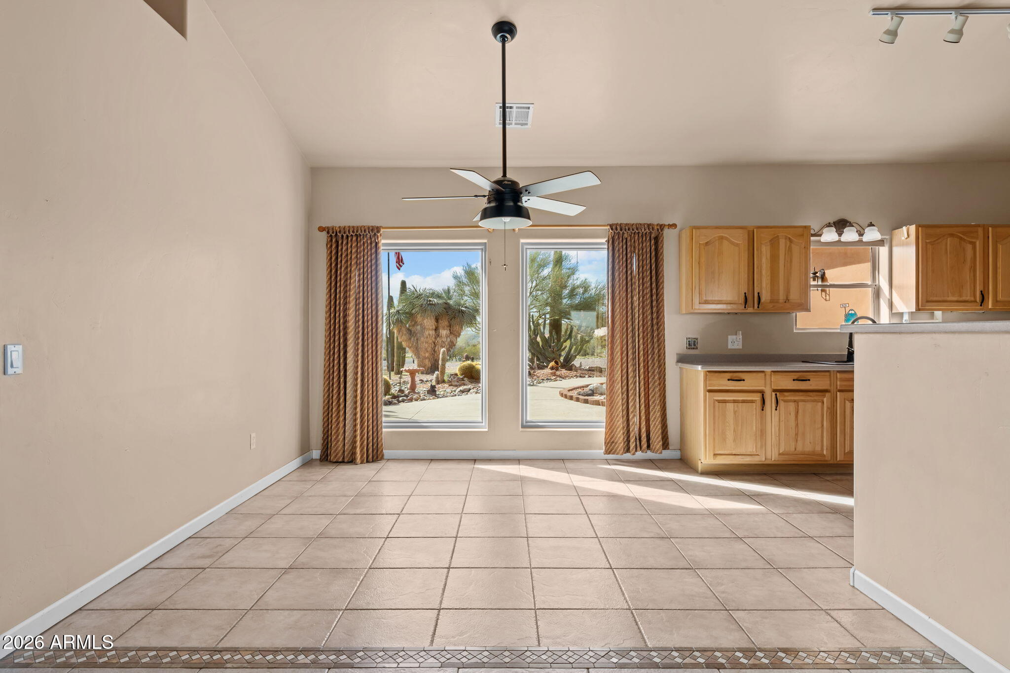 21340 Date Creek Road Wickenburg, AZ 85390 - Photo 12 of 35 a view of a kitchen with a sink and a window