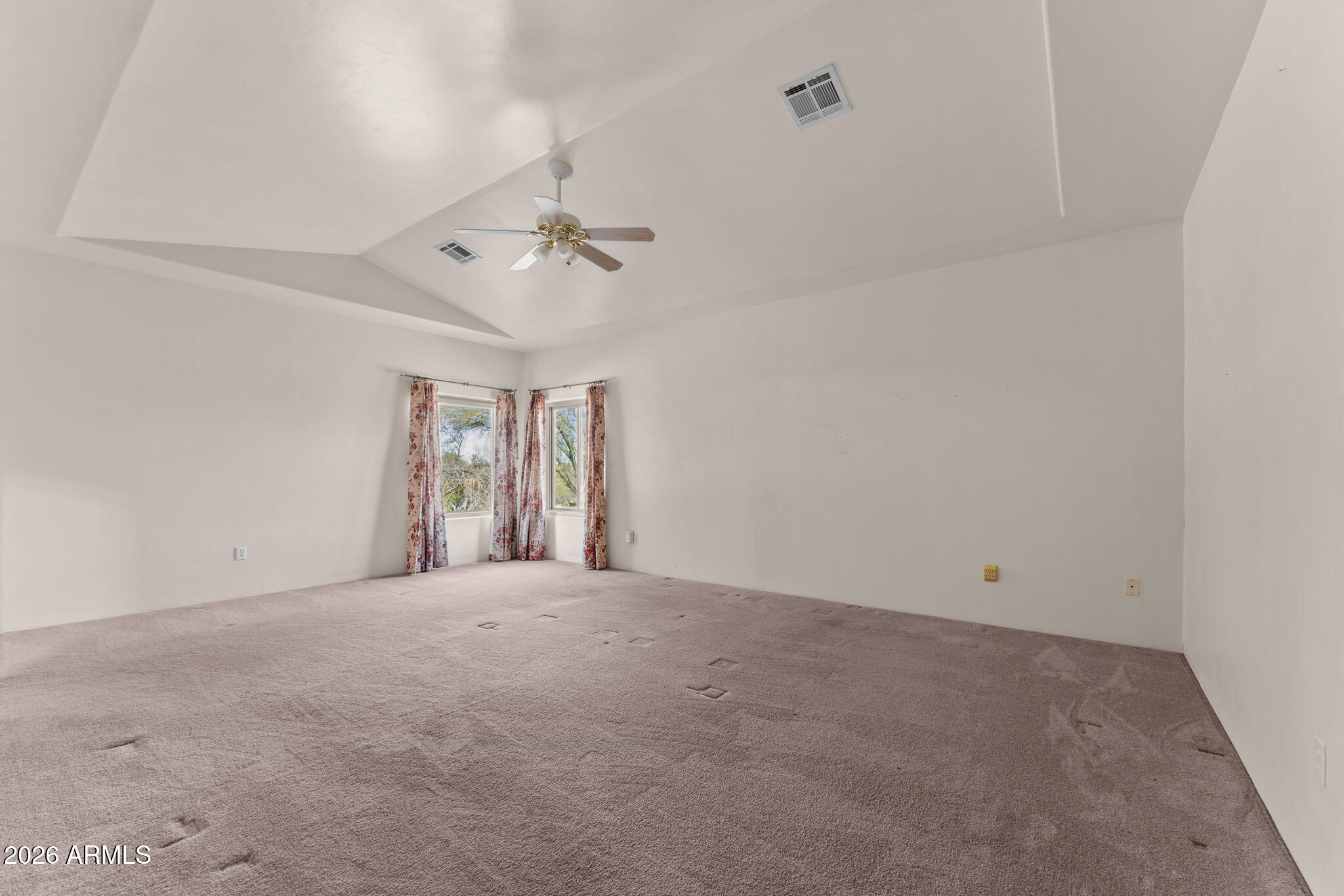 21340 Date Creek Road Wickenburg, AZ 85390 - Photo 18 of 35 a view of an empty room with a window