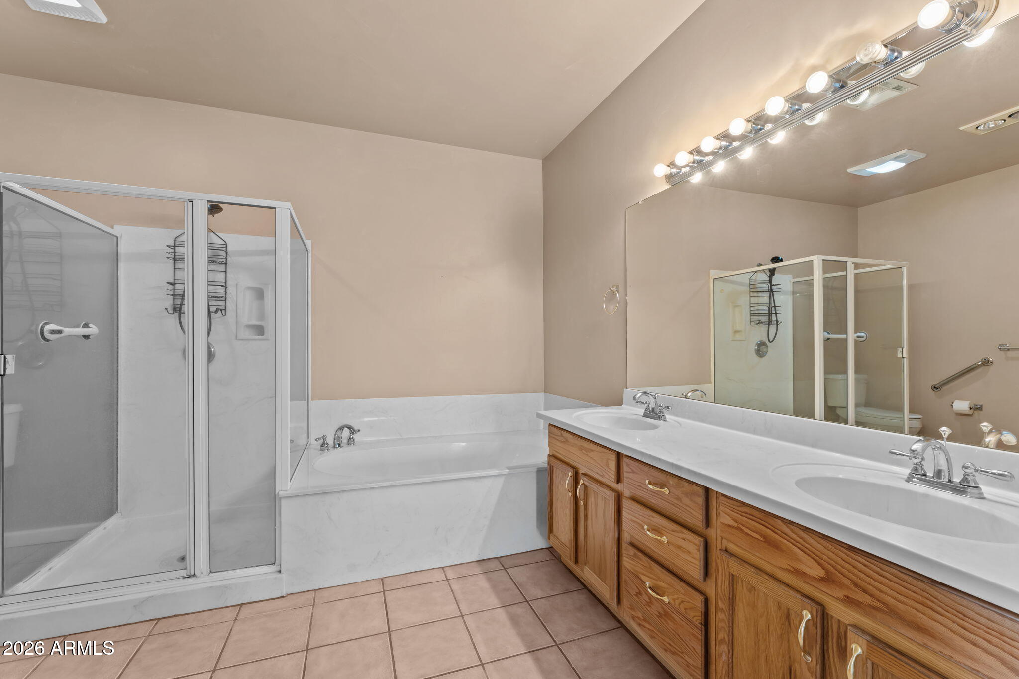 21340 Date Creek Road Wickenburg, AZ 85390 - Photo 20 of 35 a bathroom with a double vanity sink mirror and shower