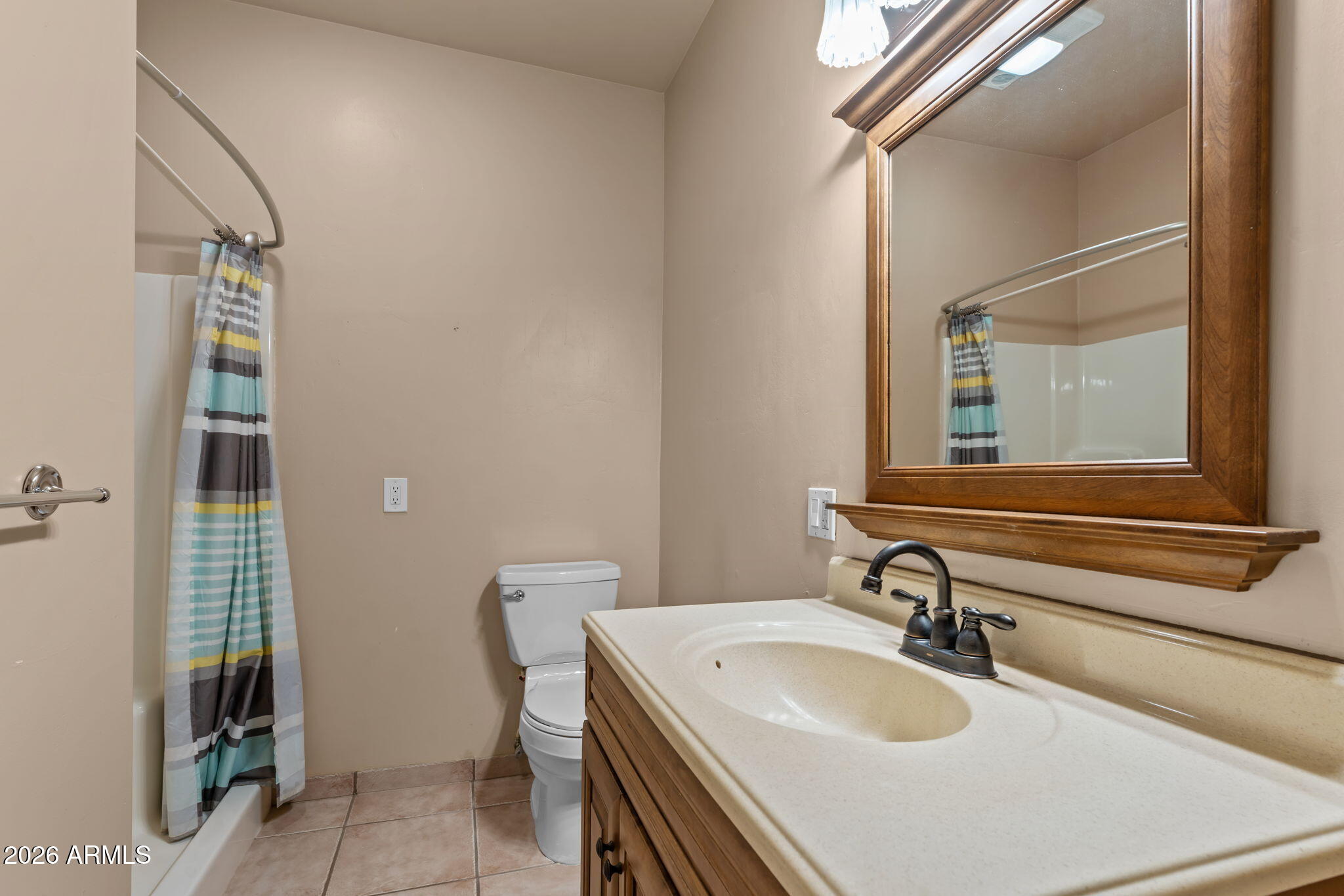 21340 Date Creek Road Wickenburg, AZ 85390 - Photo 26 of 35 a bathroom with a sink and a mirror