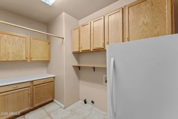 a view of walk in closet with window