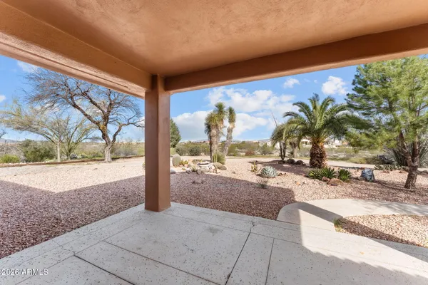 a view of swimming pool with a patio