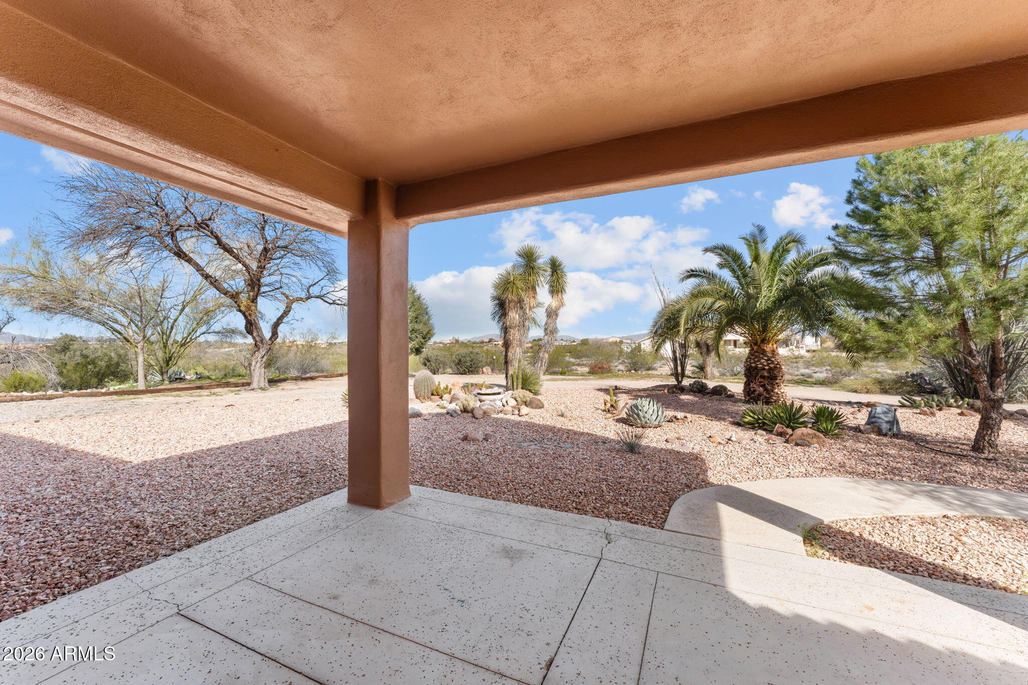 21340 Date Creek Road Wickenburg, AZ 85390 - Photo 30 of 35 a view of swimming pool with a patio