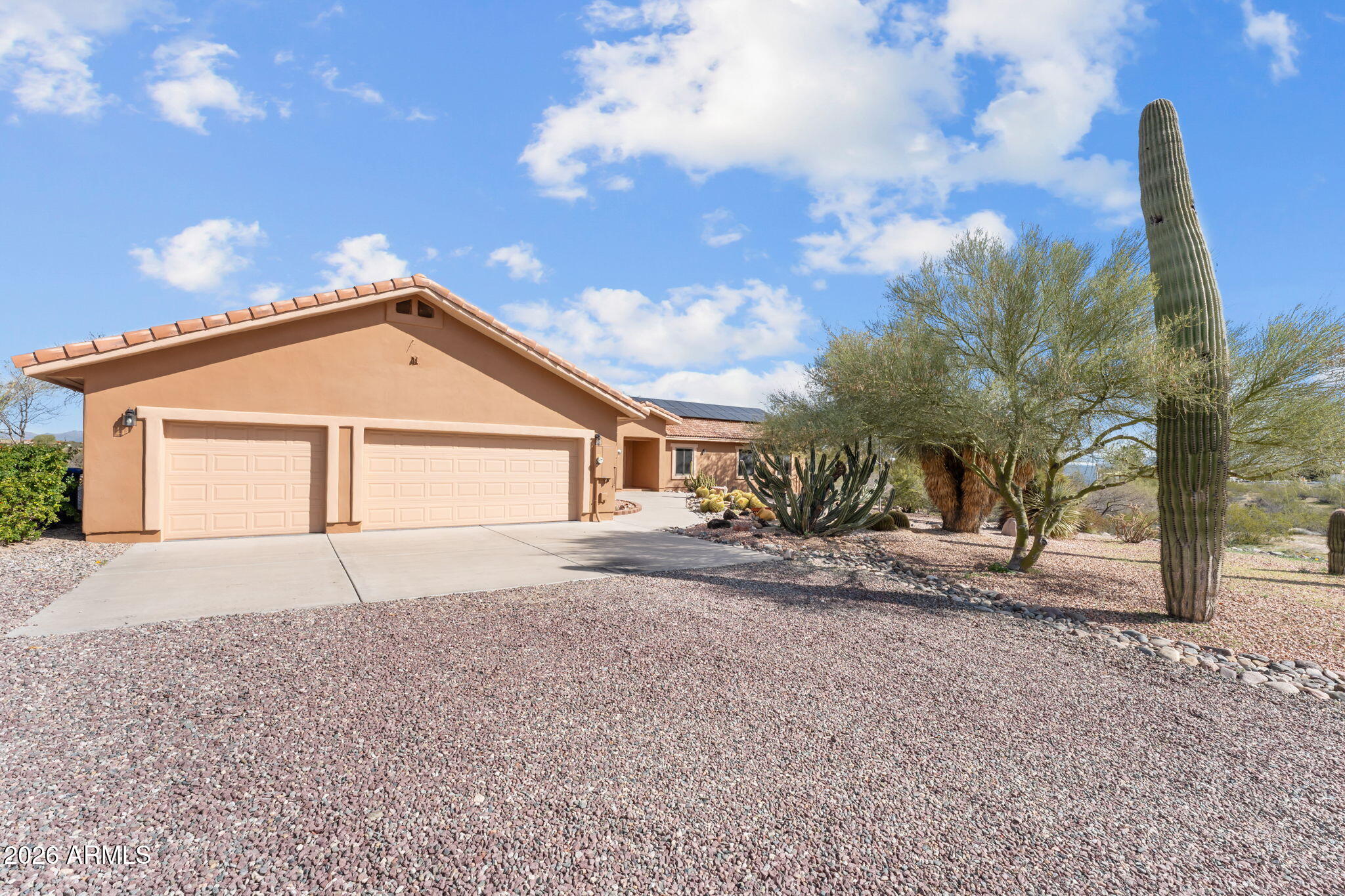 21340 Date Creek Road Wickenburg, AZ 85390 - Photo 33 of 35 a view of a house with a yard