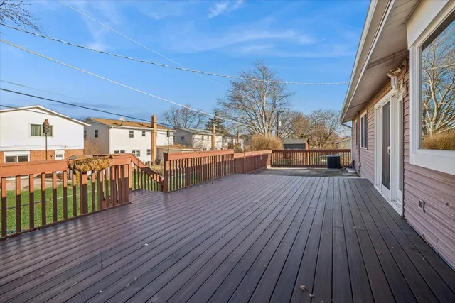 a view of a porch with wooden floor