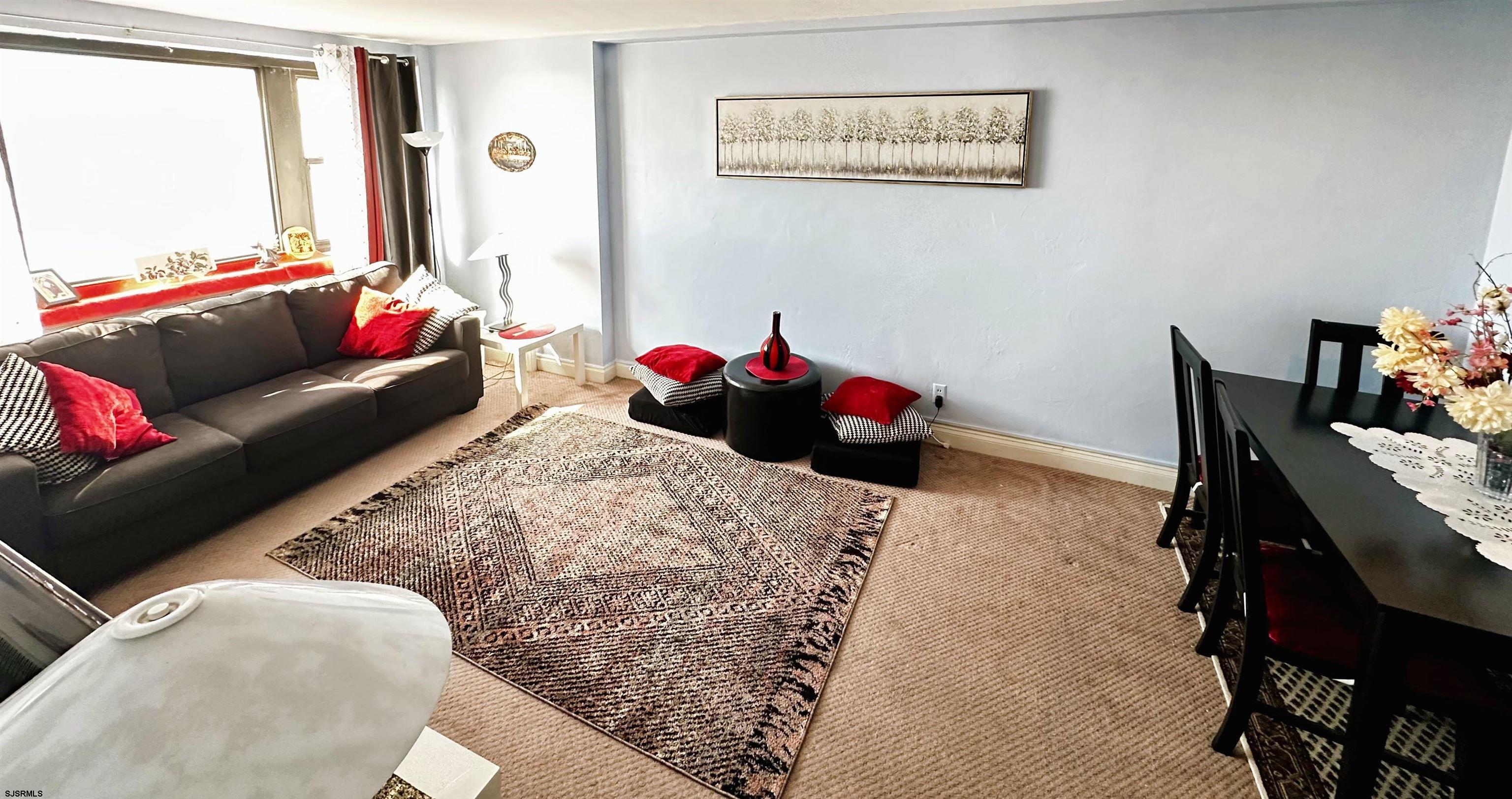 101 South Raleigh Avenue, Unit 232 Atlantic City, NJ 08401 - Photo 10 of 18 a living room with furniture and a couch