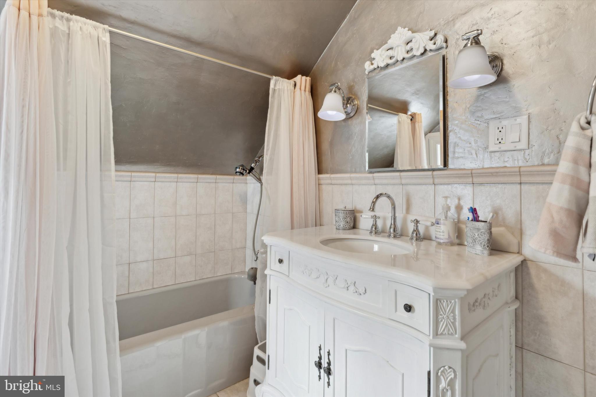 2031 Diamond Rock Road Malvern, PA 19355 - Photo 20 of 51 a bathroom with a sink and a mirror